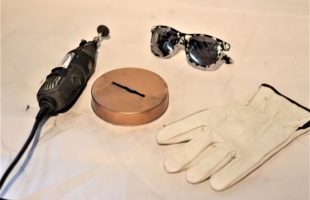 Use dremel with hand and eye protection to make the slot